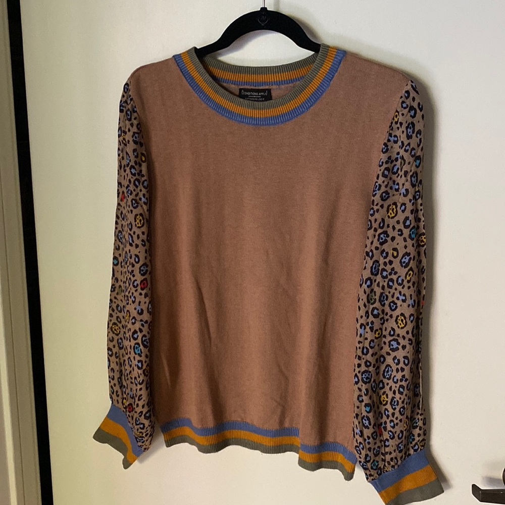 Anthropologie sweater with leopard sleeves